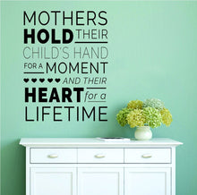 Load image into Gallery viewer, Mothers Hold Their Childrens Hand Inspiring Vinyl Decal Wall Sticker Decor Quote – Motivational Wall Murals, decorations for bedroom women