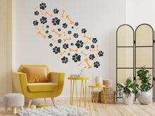 Load image into Gallery viewer, Dog Paw Print Bone Wall Decal - Pet Lover's Wall Decor, Vinyl Sticker for Grooming Salon, Pet Care, Living Room, Bedroom or Nursery 563LU