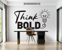 Load image into Gallery viewer, May include: A modern office space featuring a black desk with gold accents, a brown leather chair, and the words "Think BOLD" with a lightbulb graphic on the wall. The room has a minimalist design with natural light.