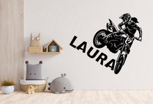 Load image into Gallery viewer, May include: Black and white wall decal of a person riding a dirt bike with the name "LAURA" written below.
